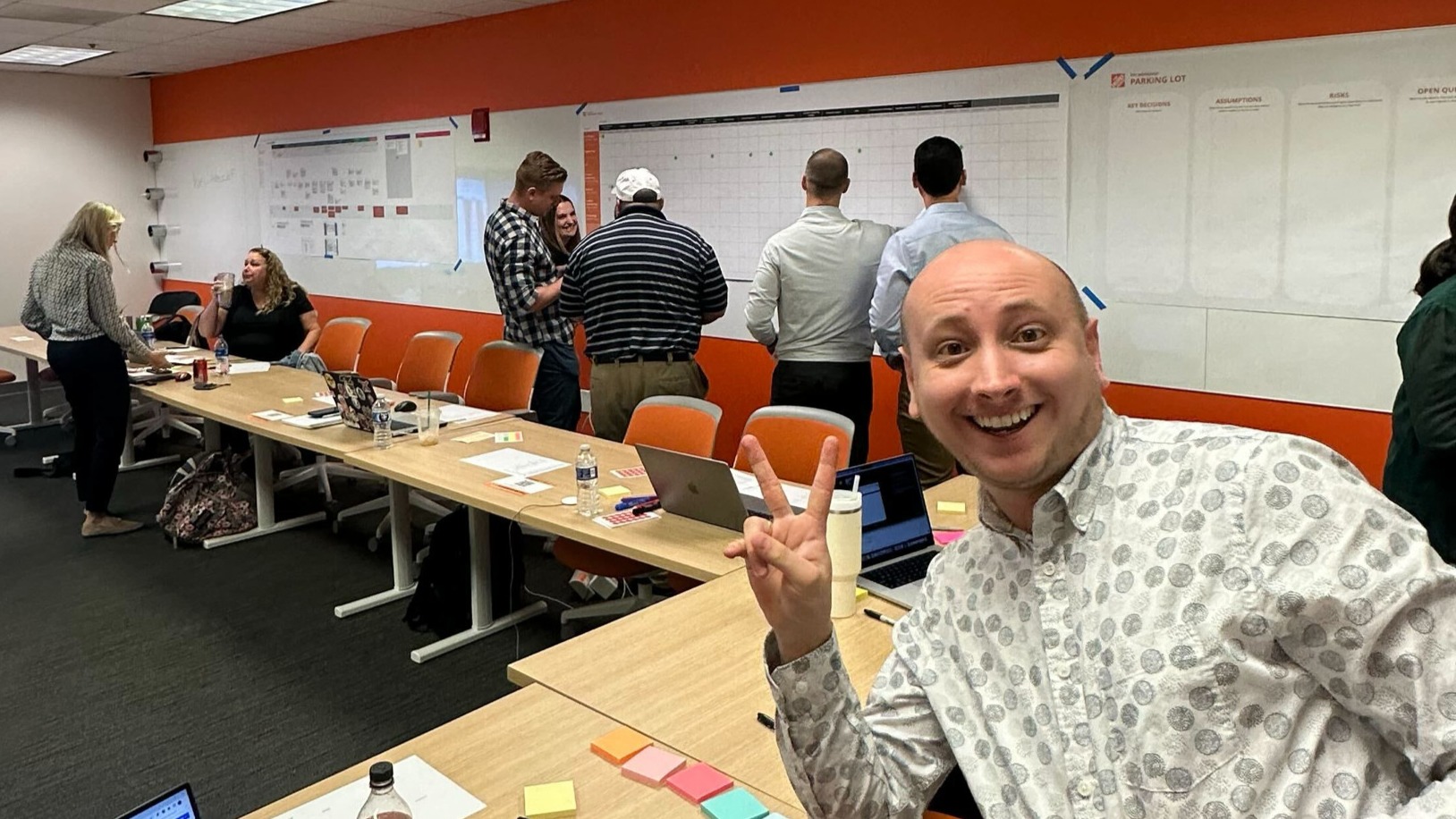 Christian photo-bombing partners participating in an activity.